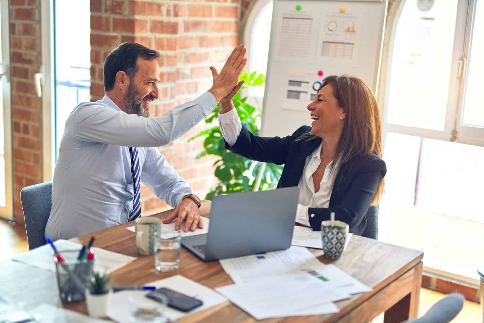 Business professionals discussing a digital project